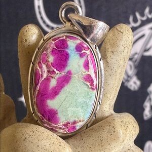 Pinks Purples Gold and Mint Green.  
Jasper Pendent
Sterling Silver